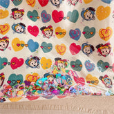 A fabulous mix of Japanese manga and American pop art styles, Japanese illustrator Osamu Harada created some of the most iconic kawaii designs of the 1980s. These Retro Radiance Star Confetti Tote Bags by Osamu Goods feature his wholesome but edgy designs in easy to clean laminated cotton, with unexpected coordinating fabric lining, pastel handles, and a blast of happy star-shaped confetti to top off all this fabulous radiance! 
